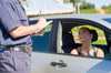 Woman begging police not to write a ticket