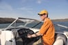 Man driving a boat