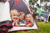 Three kids in a tent