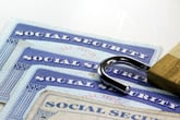 A padlock on Social Security cards