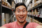 Asian man shopping in the warehouse.