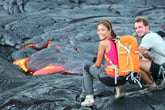 Hikers looking at lava at Hawaii Volcanoes National Park