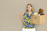 woman with box of clutter