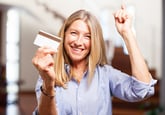 Happy woman with card