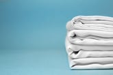 Watch This: How to Fold a Fitted Sheet Neatly in 30 Seconds