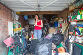 Upset woman in a cluttered garage