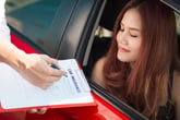 Woman ranking car insurance companies