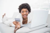 Woman shopping online from home