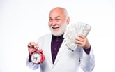 Retiree with money and a clock.
