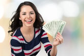 Young woman with money