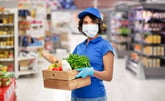 Grocery worker in a mask