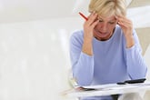 Stressed senior worried about bills