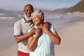 Happy senior couple at a beach