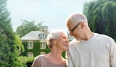 Happy senior couple retirees homeowners