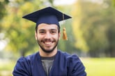 Man graduating college with a bachelor's or master's degree