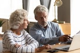 Senior couple planning retirement expenses