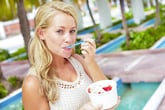 Woman eating frozen yogurt