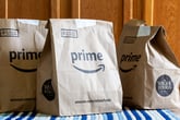 Bags of Whole Foods Market groceries delivered to an Amazon Prime member's home