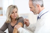 Woman getting flu vaccine