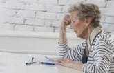 Stressed senior worrying about finances