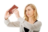 Woman with empty wallet
