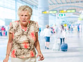 Frustrated senior woman in an airport
