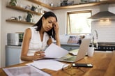 stressed out frustrated woman doing taxes