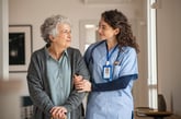 nurse aid with older woman elderly