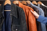 Man shopping for secondhand clothing