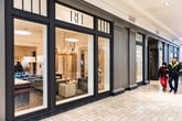 Restoration Hardware, home furniture specialty store entrance with people walking