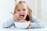 Girl eating cereal
