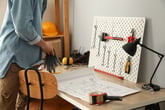 How to Organize Your Life With a Pegboard