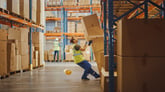 Worker in a dangerous situation falling and sustaining a workplace injury