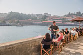 Cafe on the Douro river in Porto, Portugal