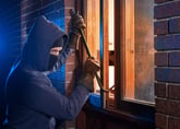 A robber breaks into home.