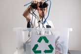 Hazardous E-Waste Recycling. Household electrical and scrapped electronic devices in recycle box.