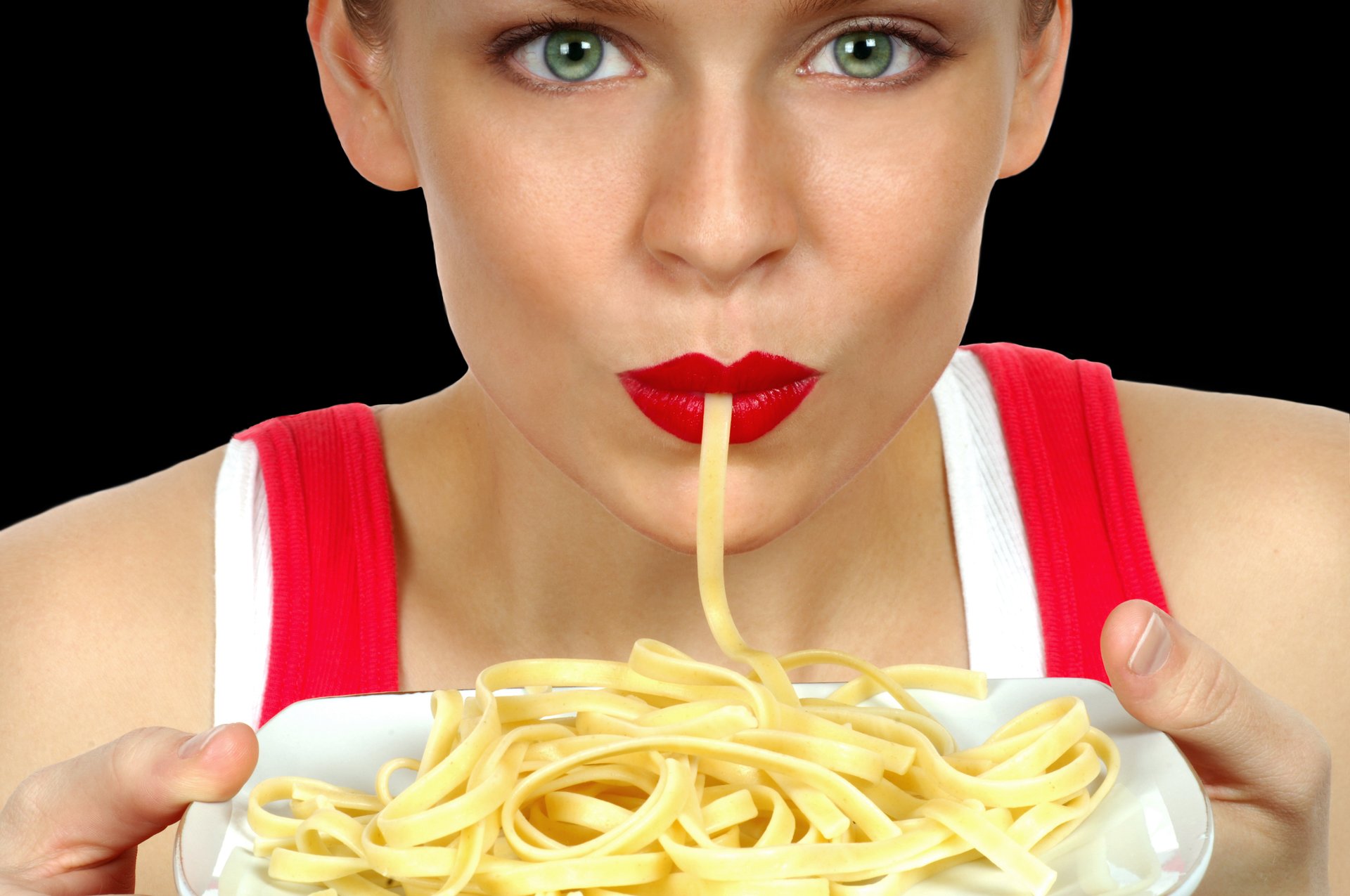 Woman eating pasta