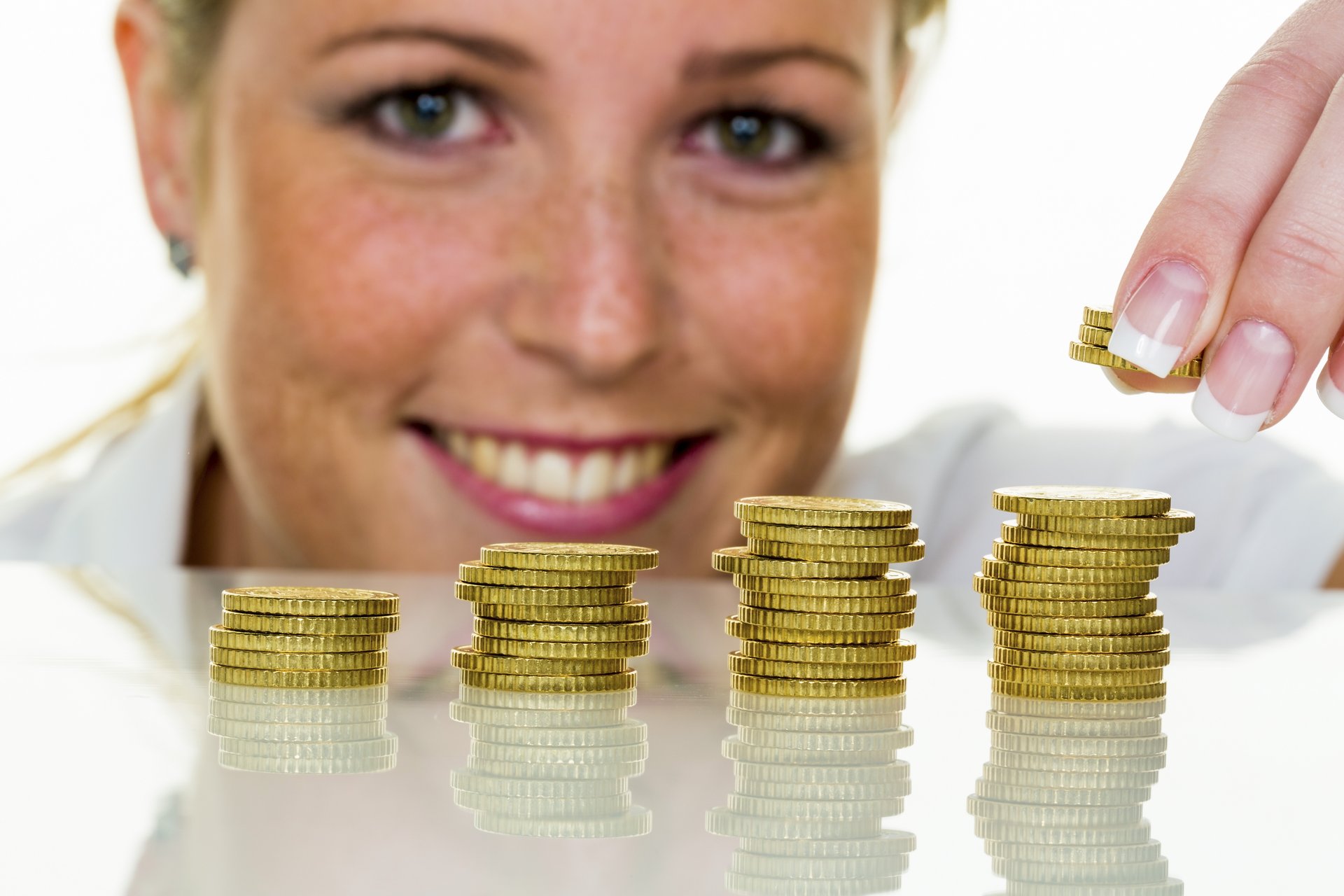 Woman Stacking Coins
