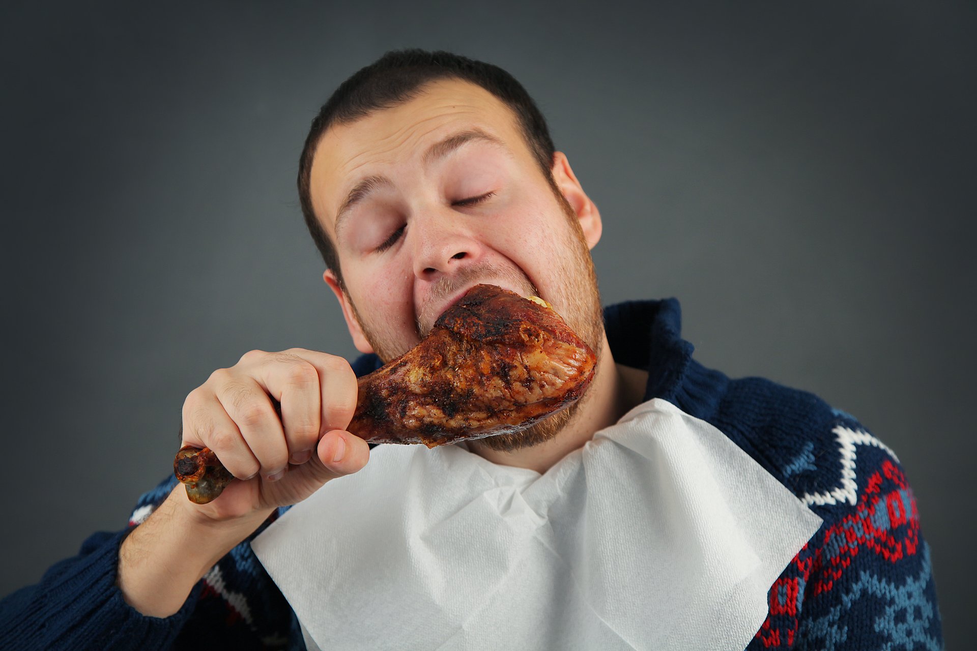 Man eating meat