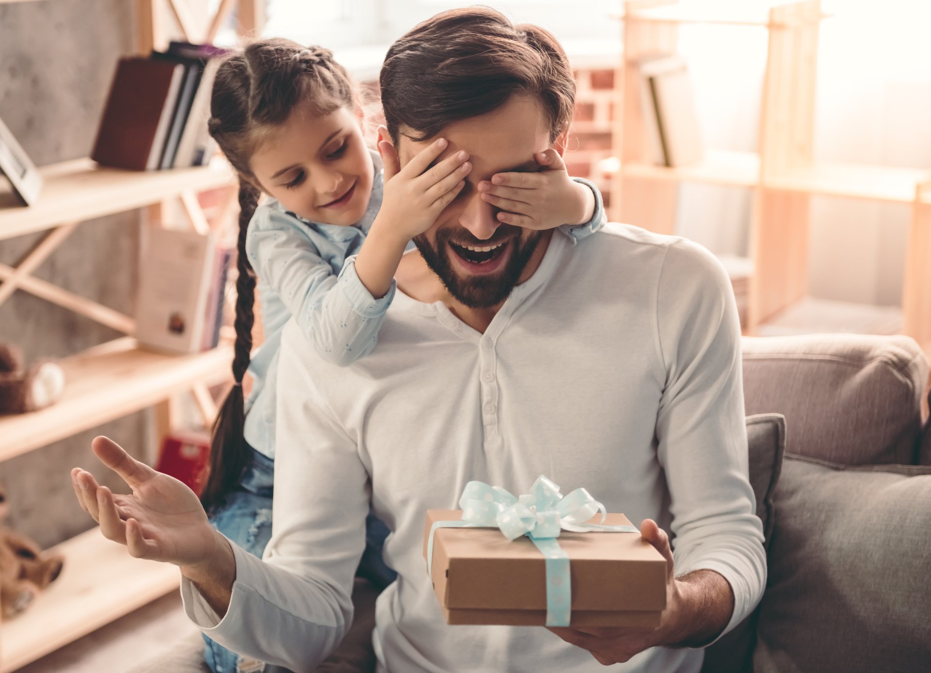 Man and daughter with gifts