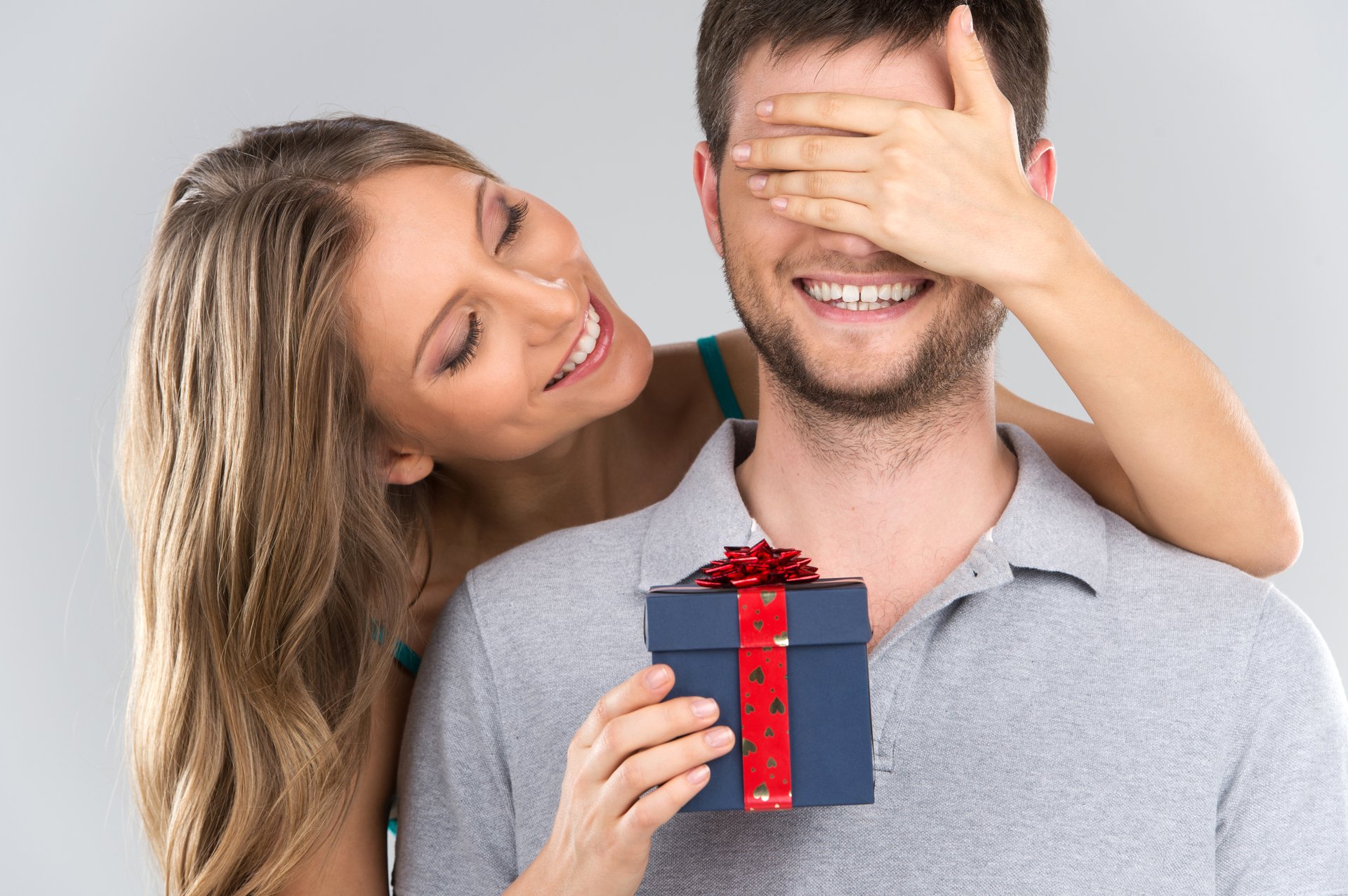 Woman giving boyfriend a gift