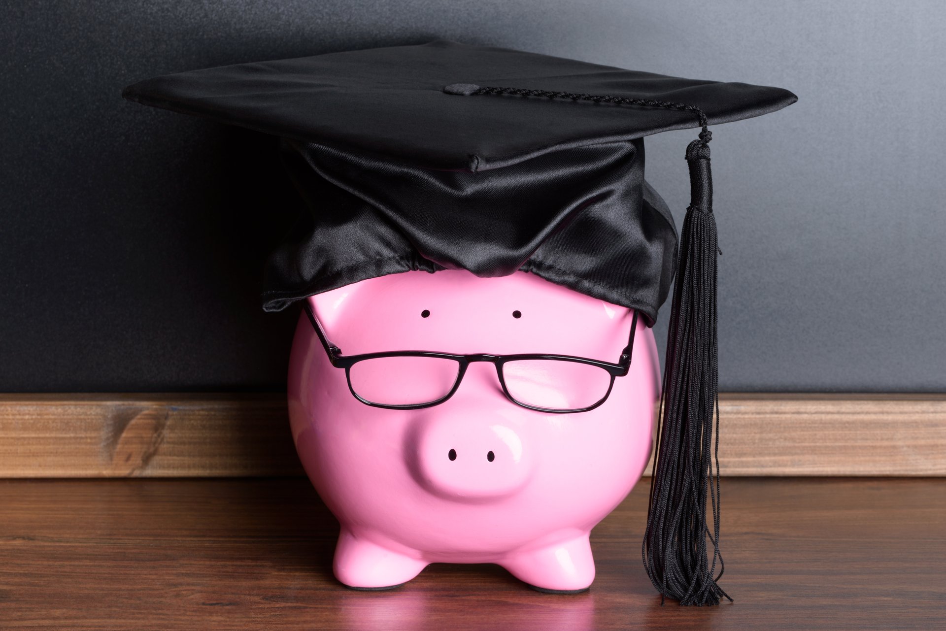 pink Piggy Bank Black Graduation cap Glasses Blackboard