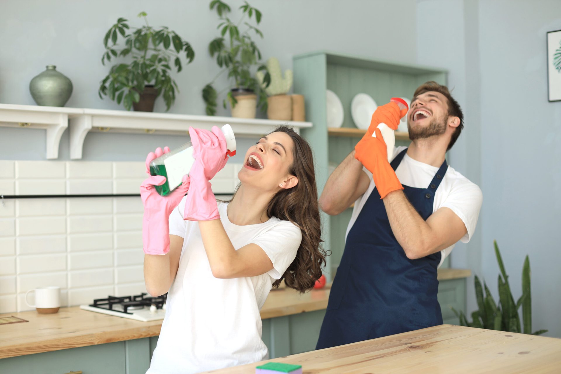 Young couple cleaning