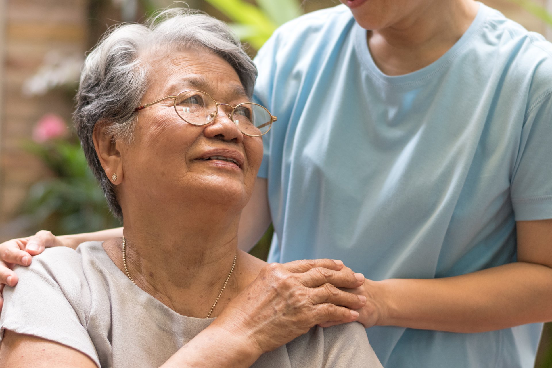A senior patient receives health care