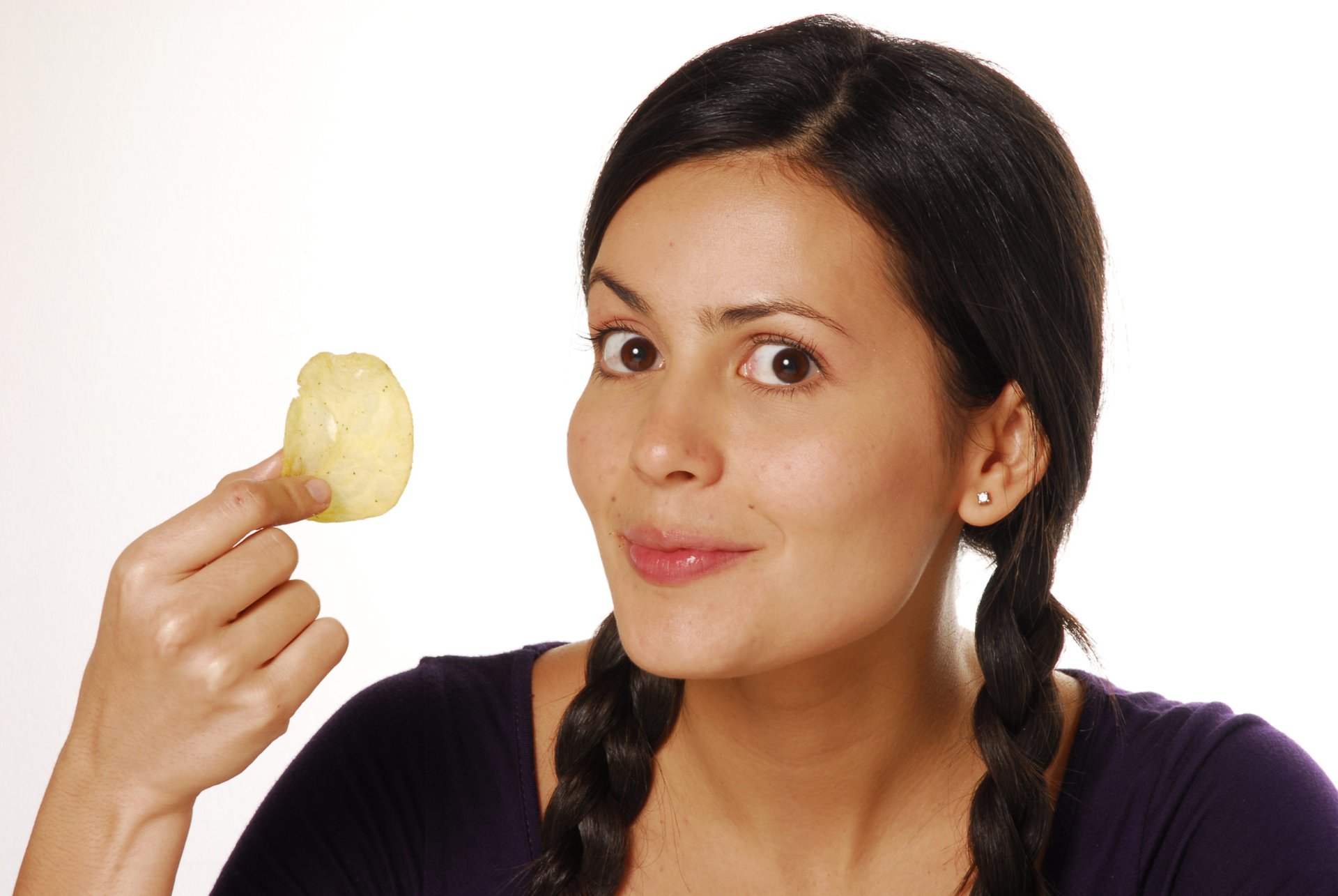 Woman holding a potato chip