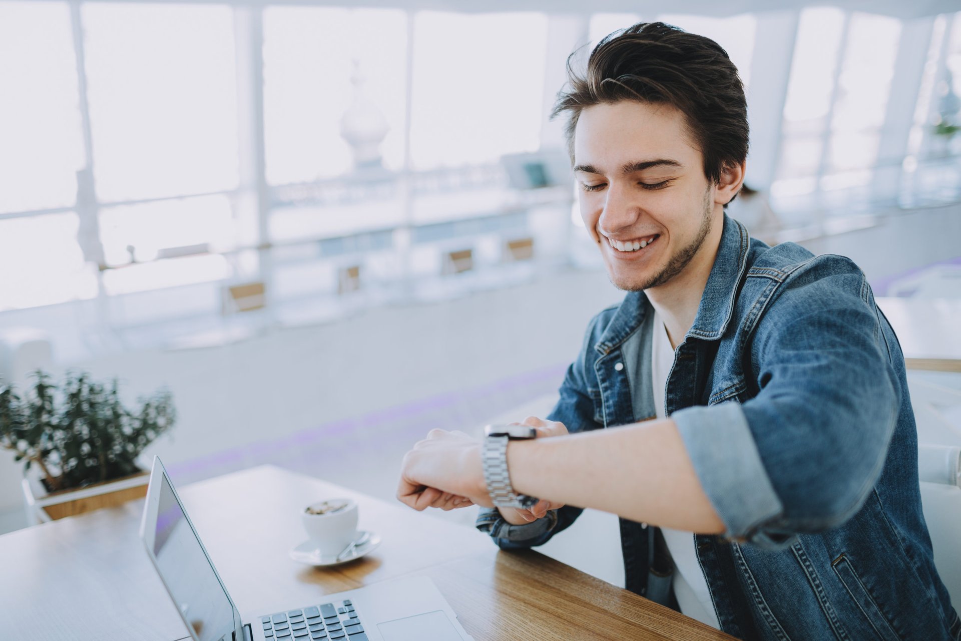 Young remote worker happy about his time saved commuting