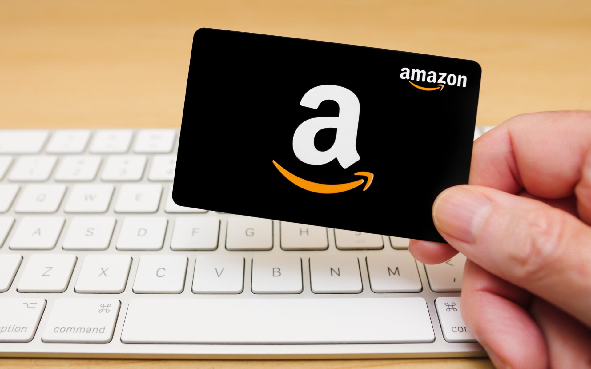 Amazon gift card in front of keyboard