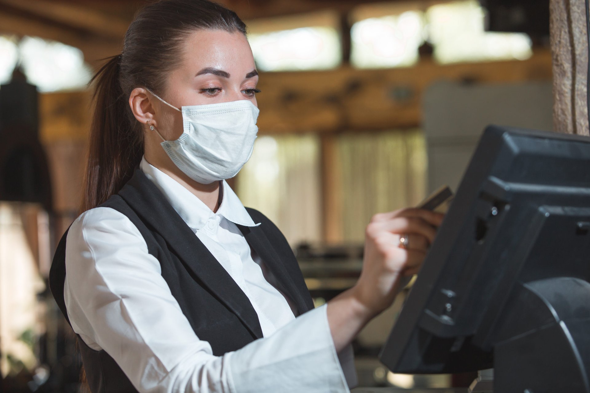 Restaurant worker in a mask