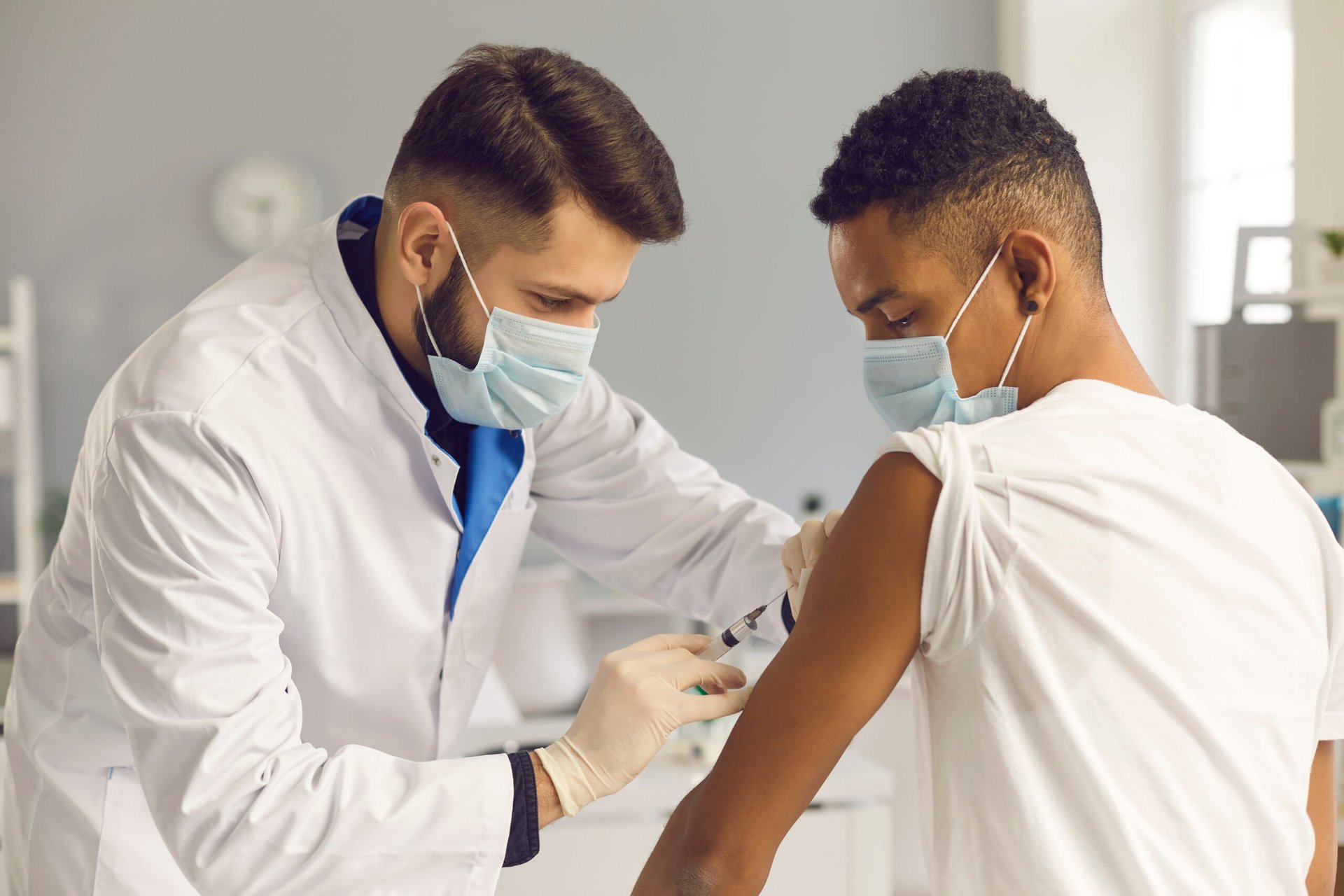 Young man getting vaccine