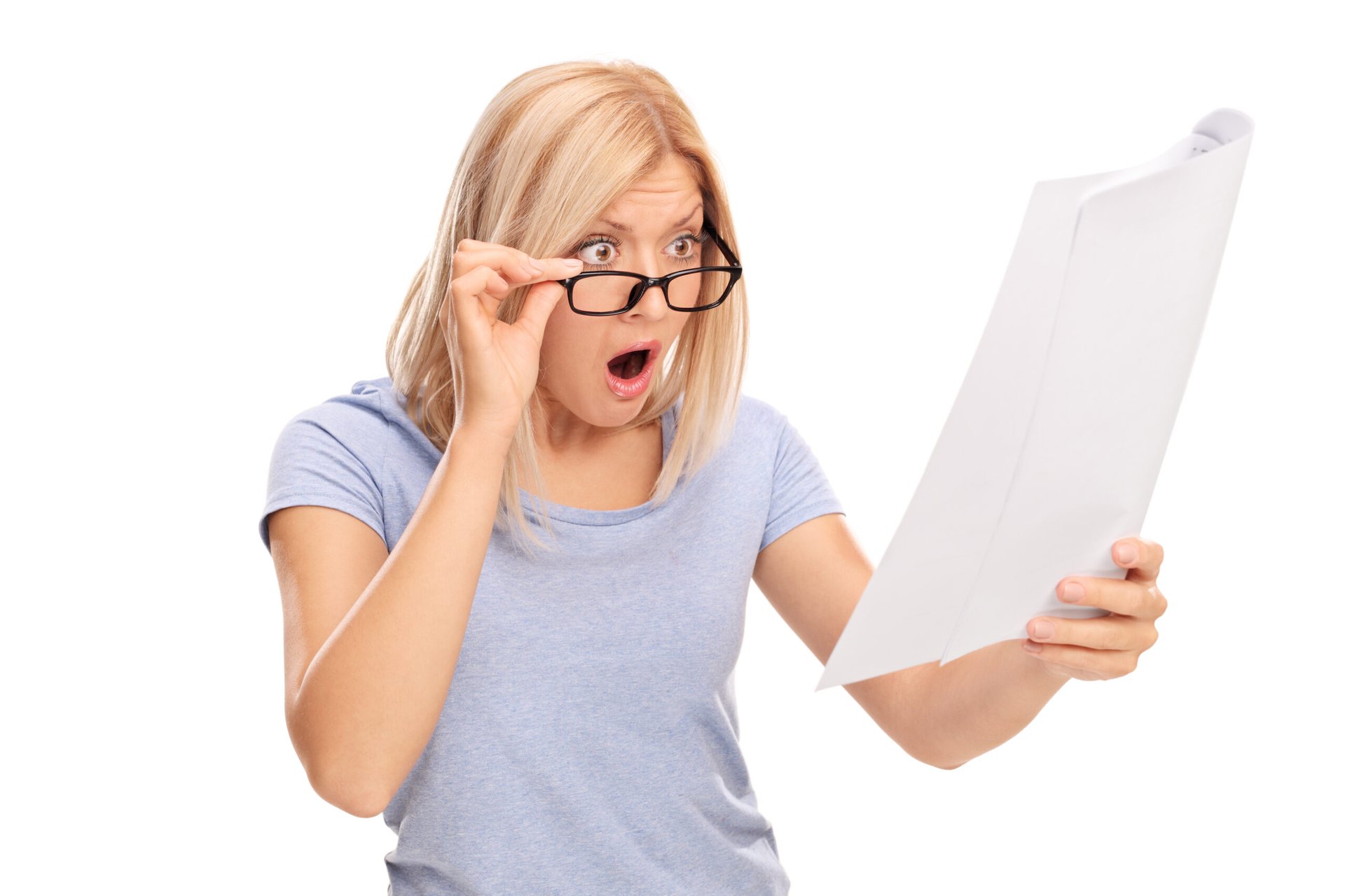 Shocked woman looking at her credit report
